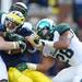 Michigan State RJ Williamson and Denicos Allen wrap up Michigan wide receiver Drew Dileo during the second quarter against Michigan State at Michigan Stadium on Saturday afternoon. Melanie Maxwell I AnnArbor.com